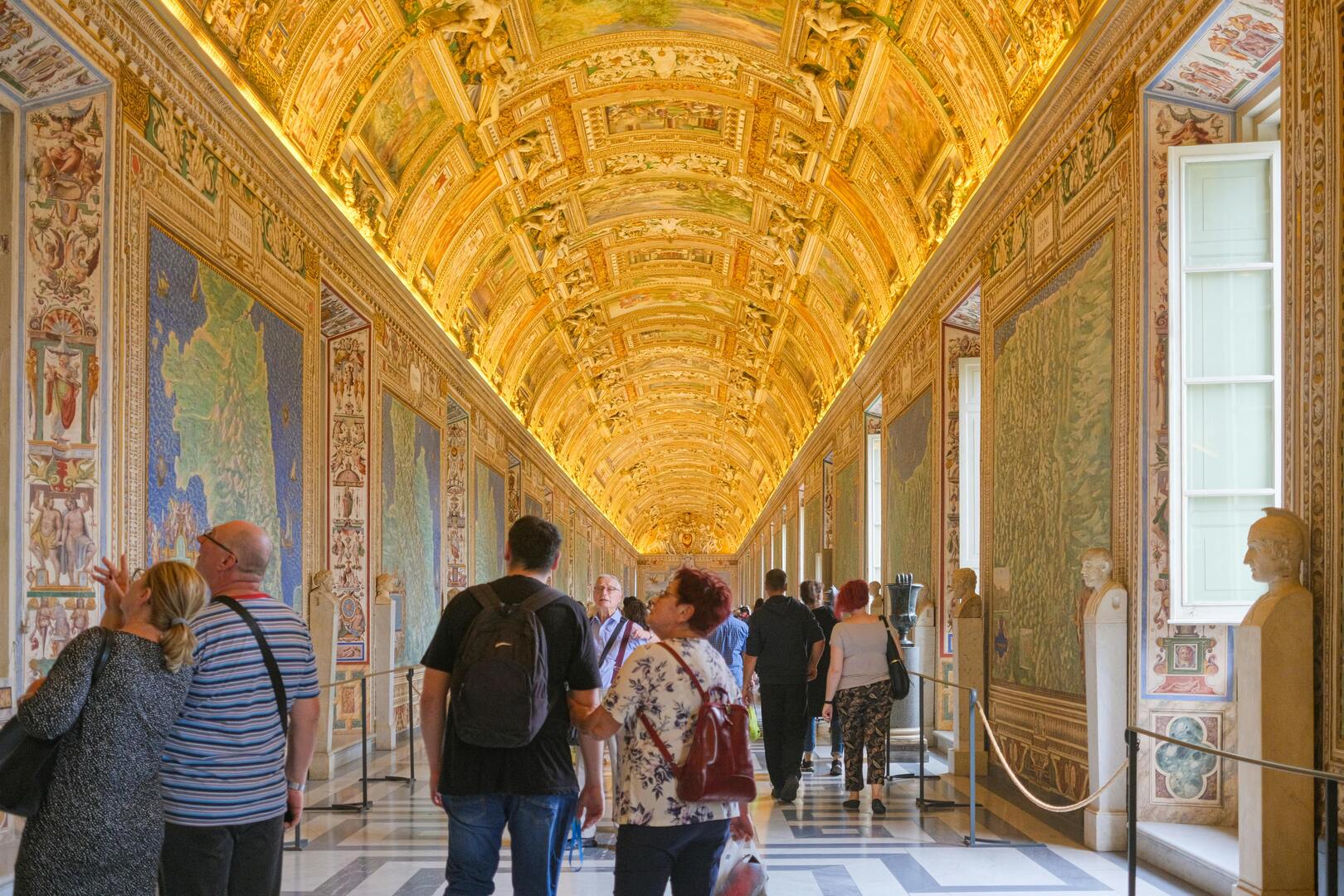 Sistine Chapel surrounded by Vatican Museums with Renaissance art collections